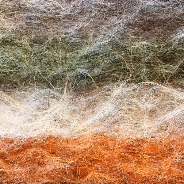 color texture of sheep wool fibers, handmade woven products