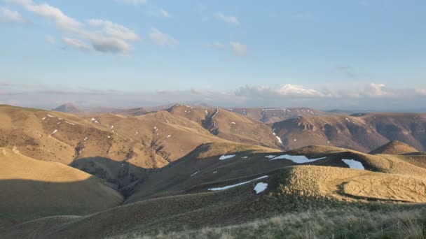 The formation and movements of clouds up to the steep slopes of the  mountains of Central Caucasus peaks. — Stock Video