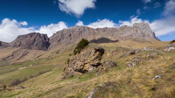 Interval shooting. Russia, the Caucasus Mountains, Ingushetia, the formation of rain clouds over the Greater Caucasus hrebttom at sunset. — Stock Video