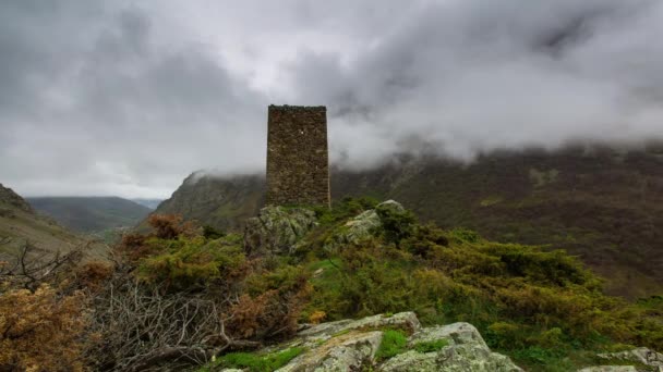 The formation and movement of clouds up to the steep mountain slopes of the  mountains of Central Caucasus peaks. — Stock Video