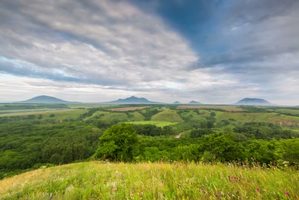 The formation of clouds over alpine meadows. — Stock Video