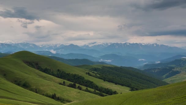 The formation of clouds over alpine meadows. — Stock Video