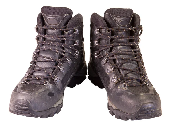 Oude zwarte trekking schoenen. — Stockfoto