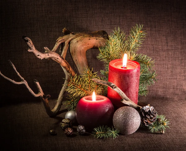 Christmas tree and decorations, decorated candles and driftwood. — Stock Photo, Image