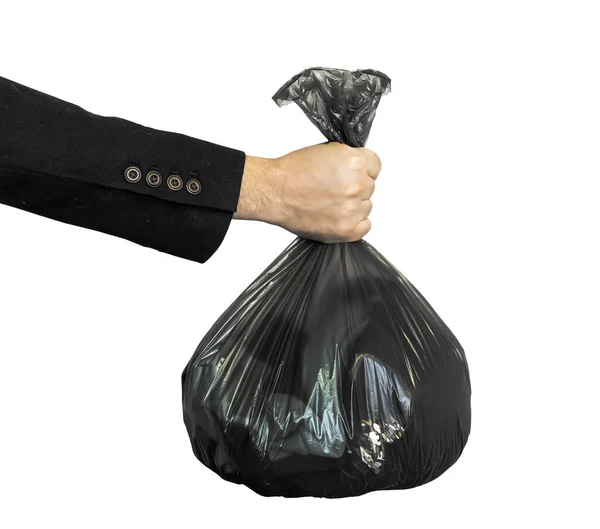 Μια Μαύρη Σακούλα Σκουπιδιών Στο Χέρι Ενός Άντρα Είναι Απομονωμένη — Φωτογραφία Αρχείου