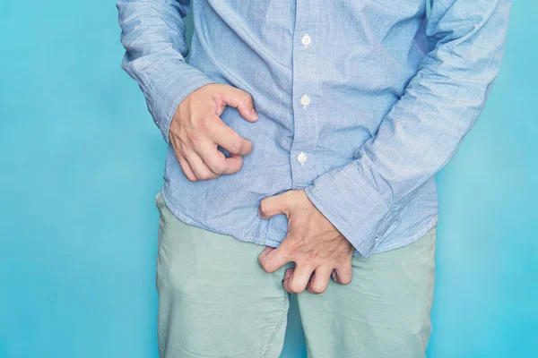Concept with Healthcare And Medicine. urinary incontinence. Itching in the groin. Man scratch the itch with hand, Penis, itching,