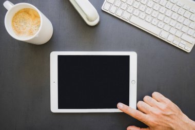finger touching tablet s screen work. Resolution and high quality beautiful photo