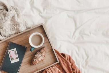 croissant coffee near book bed. Resolution and high quality beautiful photo