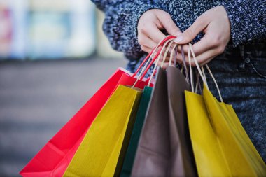 close up hands shopper with bags. Resolution and high quality beautiful photo