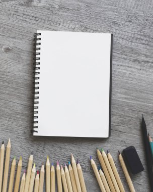 close up pencils near sketchbook. Resolution and high quality beautiful photo