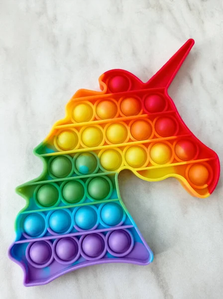 Pop Spielzeug Regenbogenspielzeug Für Kinder Form Eines Einhornkopfes — Stockfoto