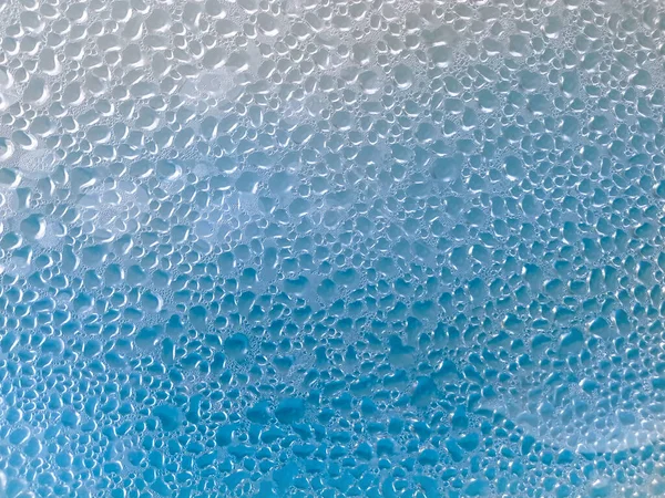 Niebieskie Tło Kropel Wody Przezroczystej Powierzchni — Zdjęcie stockowe