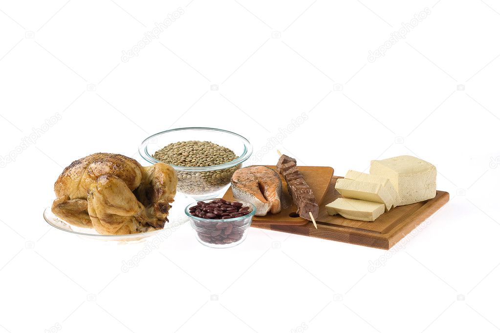 Assortment of Cheese and Meat on a Wooden Board