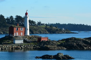 Fisgard lighthouse,Fort Rodd Hill,Victoria BC,Canada,January 29th 2015.A naval battalion used to be stationed here during the second world war for coastal protection.Veteran ans all would enjoy the relaxing walk around this National Historic park. clipart