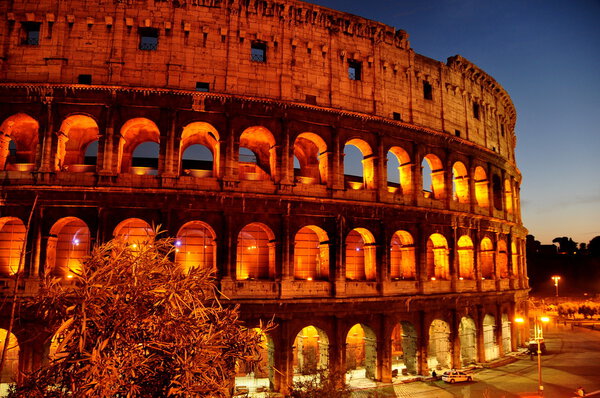 The Roman Colosseum at night in the Eternal City.A fine piece of antiquity architecture dots the Rome skyline.