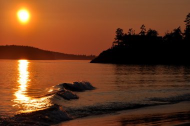 Sunset on Mackenzie beach,Tofino BC. clipart