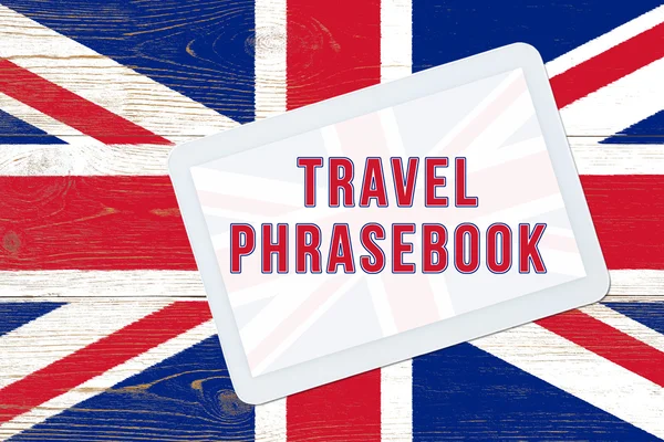 Cestovní konverzační příručka, na vlajku — Stock fotografie
