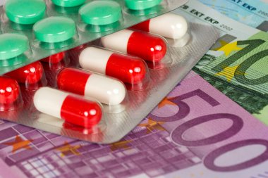 antibiyotik kapsül ve euro banknot