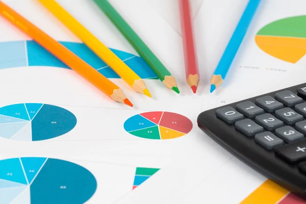 Pie and bar charts with pencils and calculator 3 — Stock Photo, Image