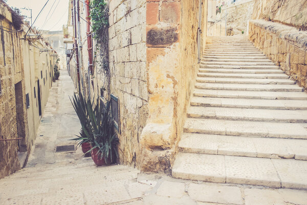 Stairs on the street of la Valletta, Malta. Two different ways to choose. Moving up to Success concept