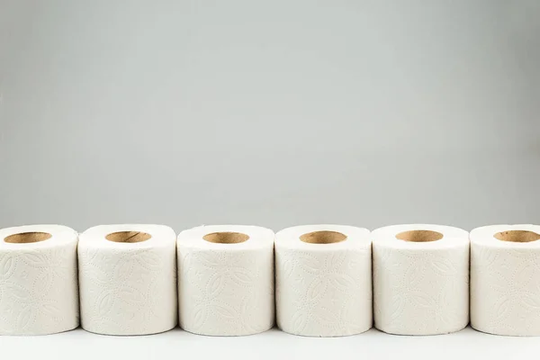 Row Toilet Paper Rolls Gray Background Copy Space Text — 스톡 사진