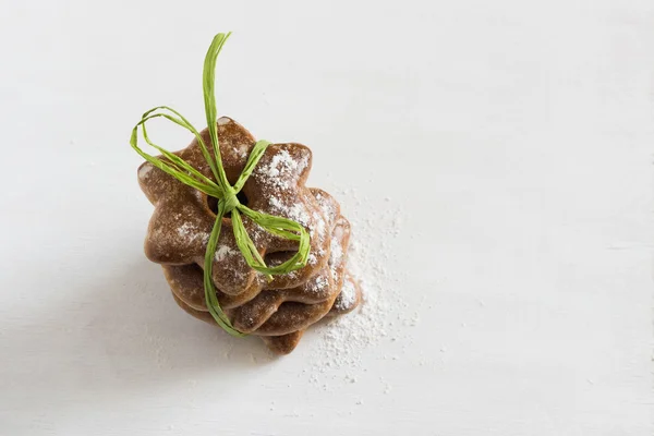 Bavarian cookies iced with sugar powder on the white background — Stock Photo, Image