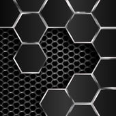 geometrisches Muster von Sechsecken mit schwarzen Metallplatten