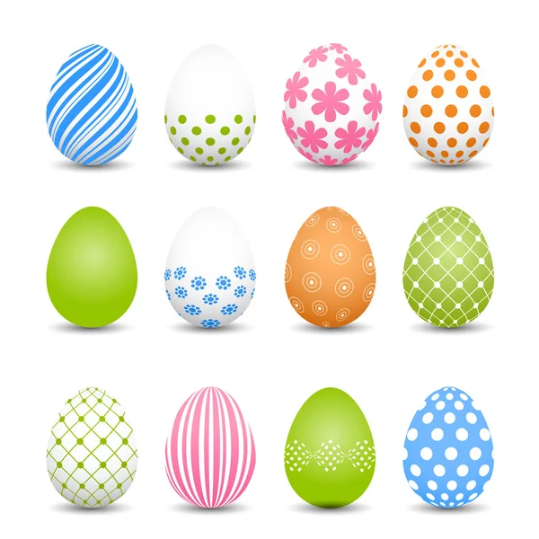 Conjunto de huevos de Pascua de colores sobre un fondo blanco — Vector de stock