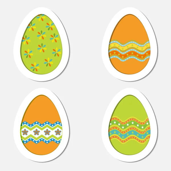 Conjunto de huevos de Pascua de colores sobre un fondo blanco — Vector de stock