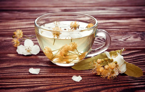 Cup of tea with jasmine and linden flower