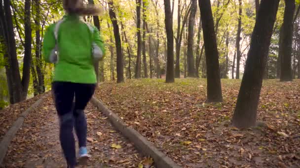 Runner Training Autumn Park Woman Running Water Bottle Active Healthy — Stock Video