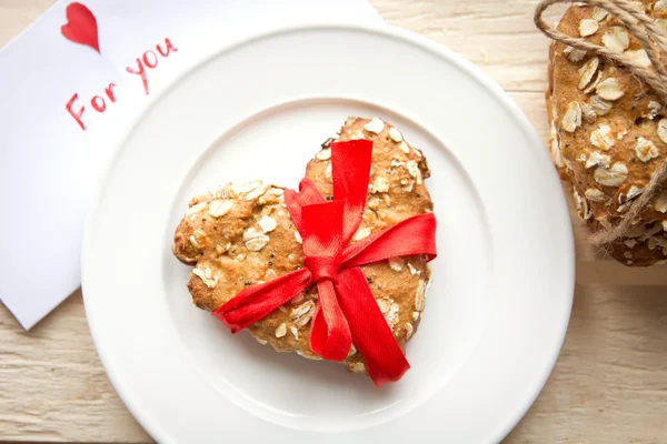 Листівка до Валентинова дня і cookie — стокове фото