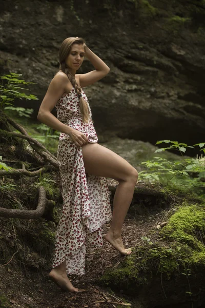 Beauty woman in  primeval landscape