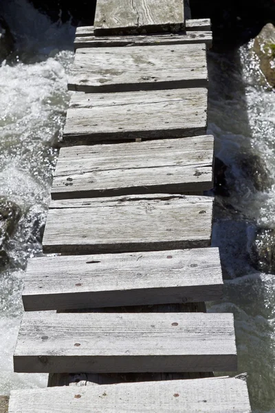 Wooden footbridge in Tyrol — Stock Photo, Image