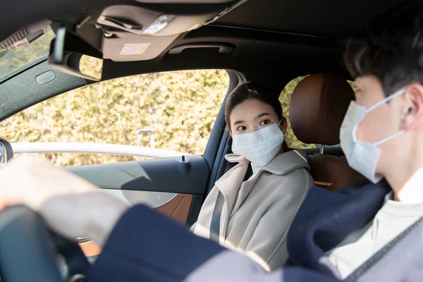 wearing mask in car, covid virus