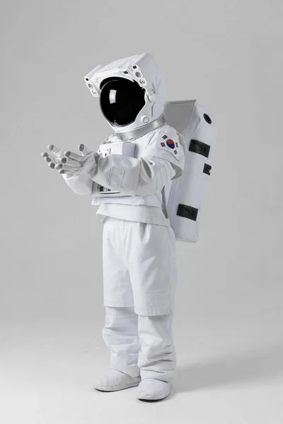 Astronaut Holding Both Hands White Background — Stock Photo, Image