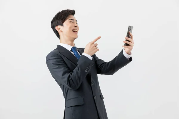 Asian Man Businessman Laughing Smartphone — Stok fotoğraf