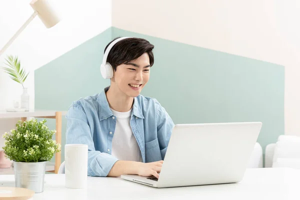 Asian Handsome Young Man Headset Using Laptop — Stok fotoğraf