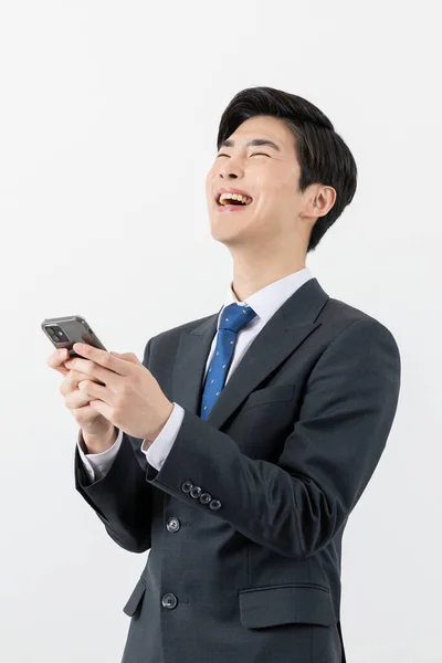 Asian Man Businessman Laughing Smartphone — Stok fotoğraf