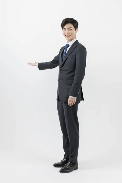 Asian Man Businessman Employee Guiding One Hand — ストック写真