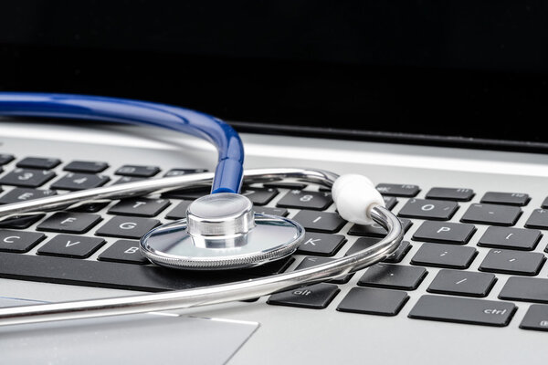 Medical Research, stethoscope on laptop keyboard