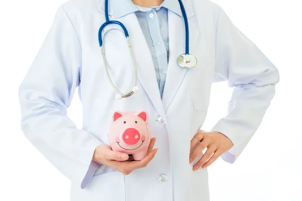 Medicinska försäkring, piggybank med stetoskop — Stockfoto