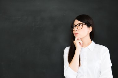 young asian teacher think about build up a good education