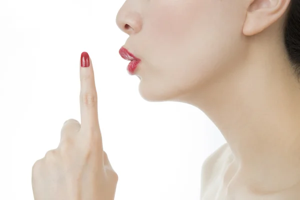 Calla el dedo en los labios — Foto de Stock