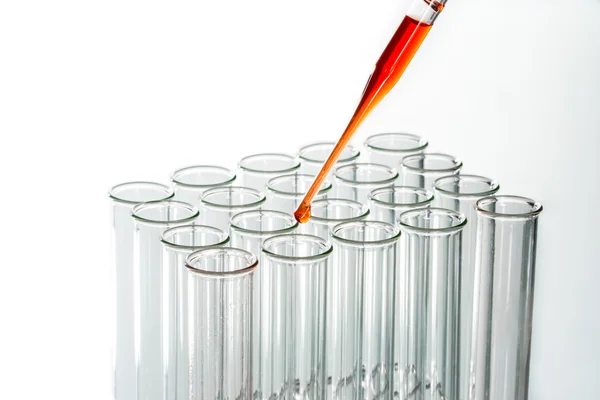 Test tubes and pipette drop, Laboratory Glassware — Stock Photo, Image