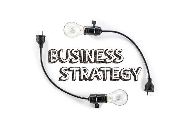 Businesss strategy phrase and light bulb, hand writing, Marketin — Stockfoto