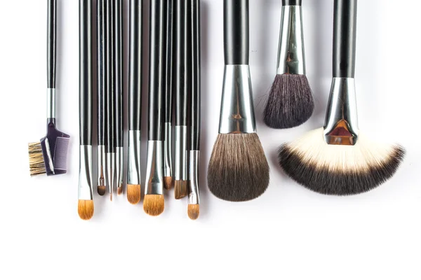 Un conjunto de cepillo cosmético, vista de ángulo alto, moda y belleza —  Fotos de Stock
