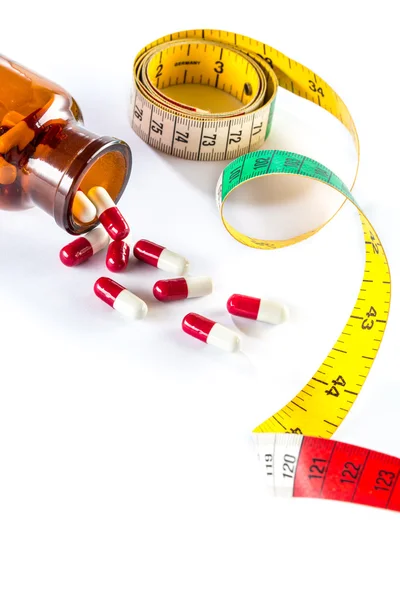 Measuring tape with capsule,  Dieting by medicine — Stock Photo, Image