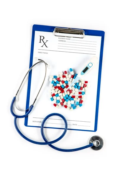 Thermometer with pills Stethoscope and RX form — Stock Photo, Image