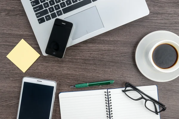 Laptop Mobile Phone and Tablet with notebook on the desk — Stock Photo, Image